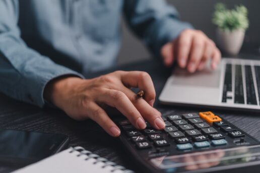Businessman,Using,Calculator,Bookkeeping,Payroll,And,Budget,Tax.,Business,Document Businessman,Using,Calculator,Bookkeeping,Payroll,And,Budget,Tax.,Business,Document