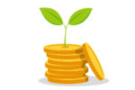 A,Plant,Growth,On,Top,Of,Pile,Of,Coins